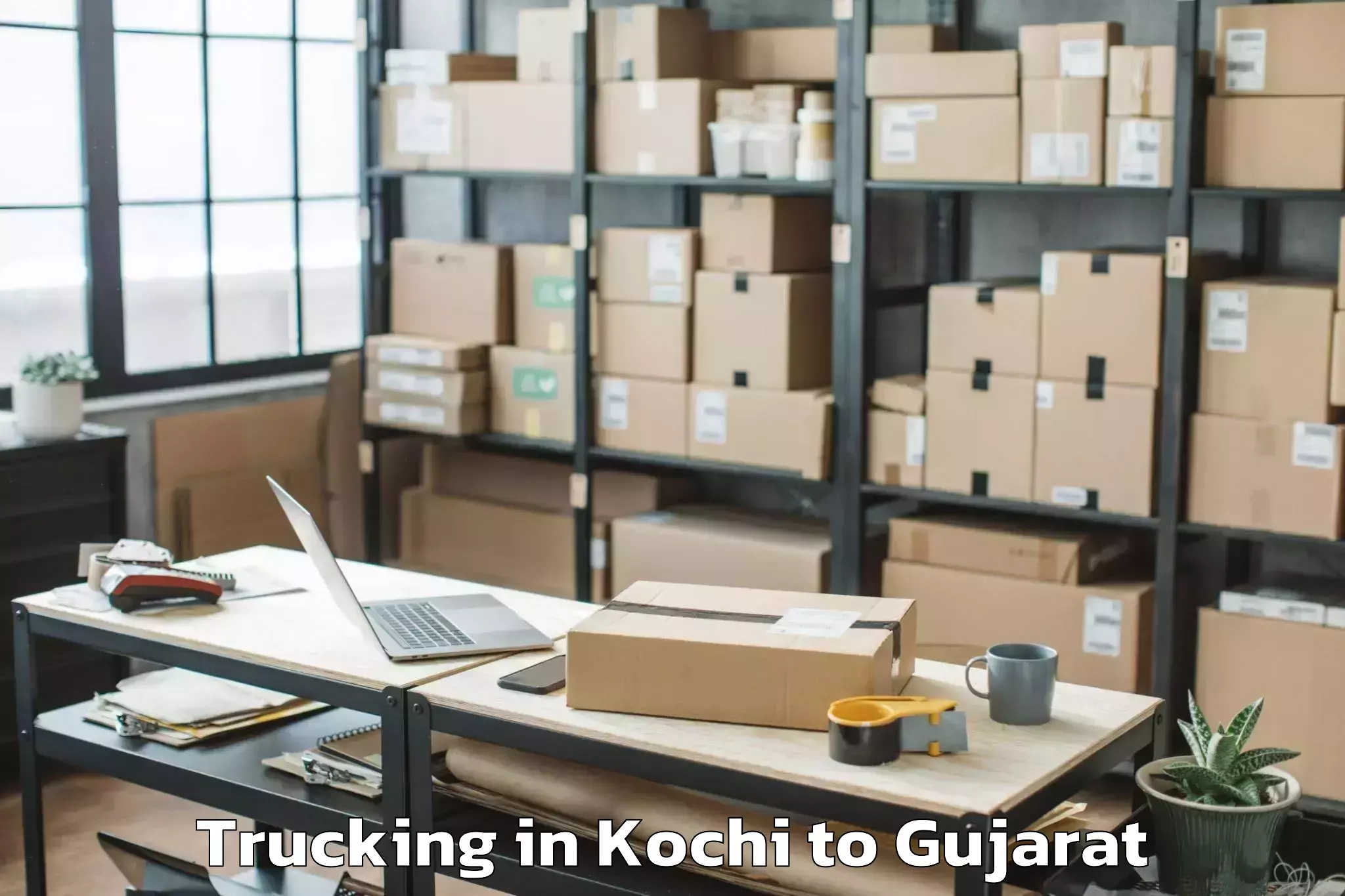 Top Kochi to Jetpur Trucking Available